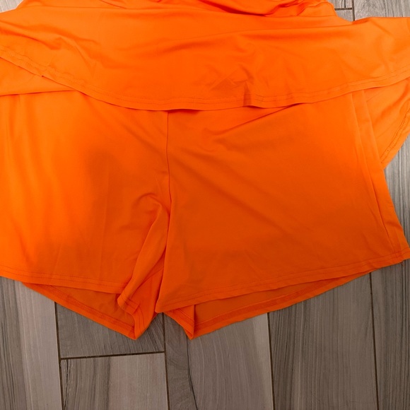 All orders ship 1-3 business days!
The color is_ orange
Romper/dress with shorts - Picture 2 of 2